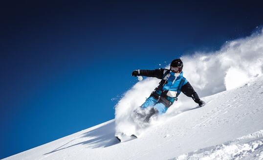 extreme skier in powder snow