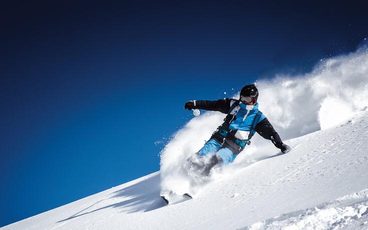 extreme skier in powder snow