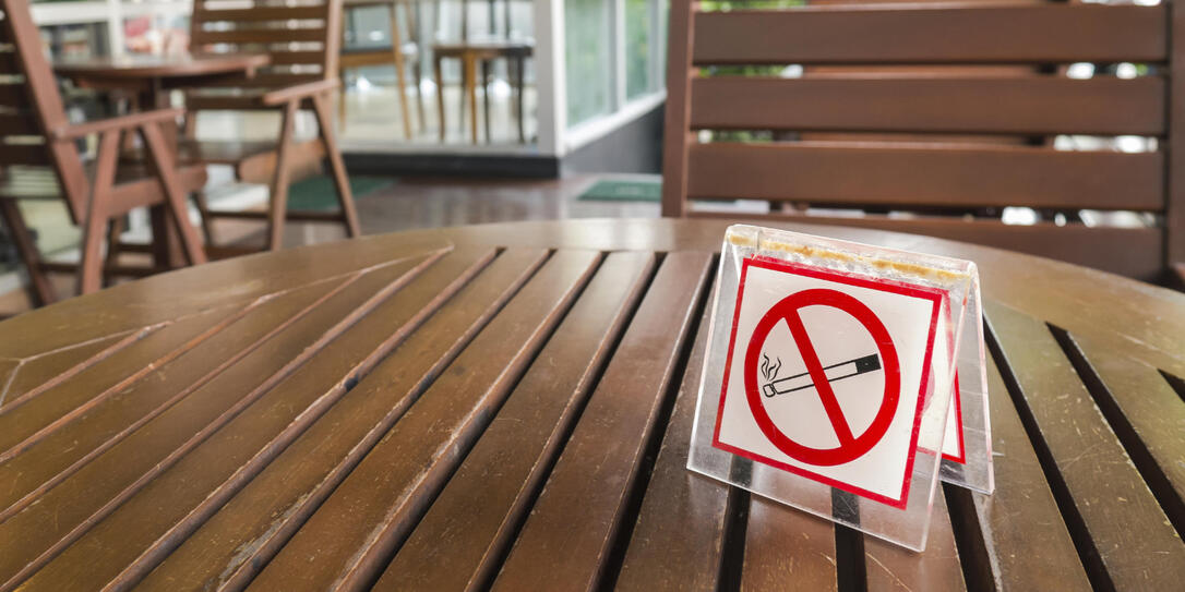 no smoking sign displayed on a table