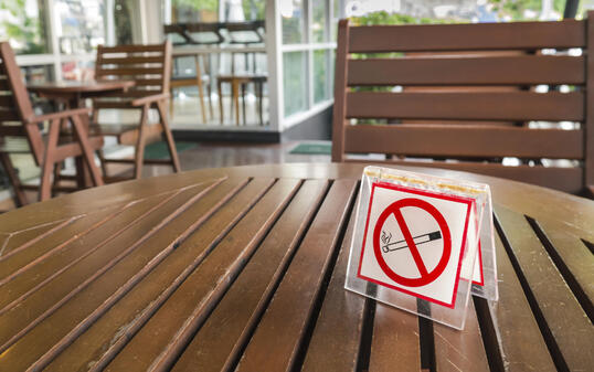 no smoking sign displayed on a table