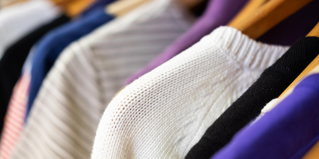 Rack of Sweaters in Second Hand Store