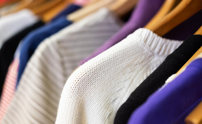 Rack of Sweaters in Second Hand Store