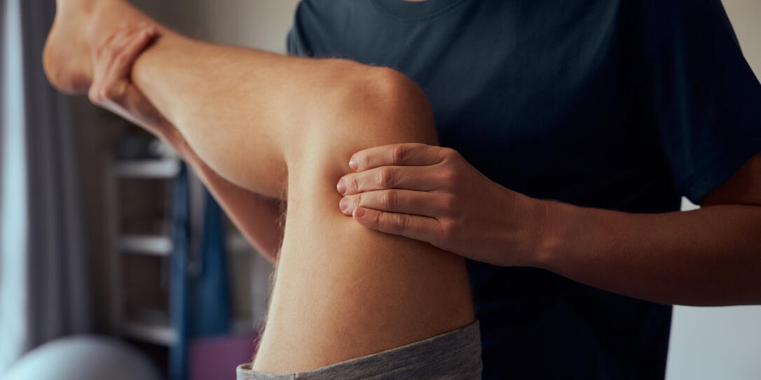 Closeup of physiotherapist hands giving therapy treatment to patient