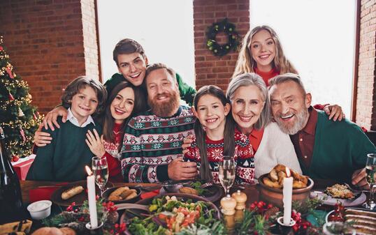 Photo of group family members cuddle posing gather celebrate christmas apartment indoors