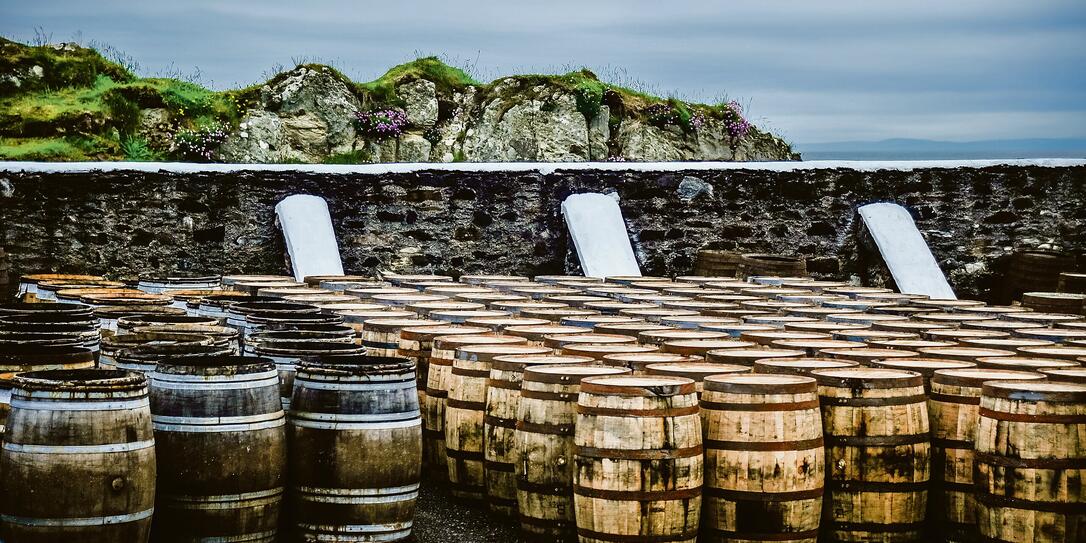 Whisky barrels by the sea