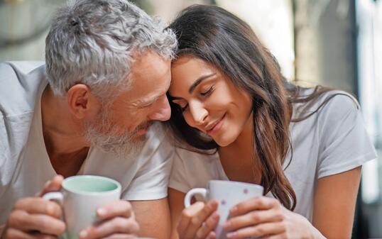 Lovely couple having their mornng coffee together