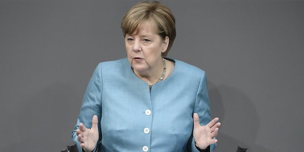 Die deutsche Kanzlerin Angela Merkel warnt vor "Isolationismus und Protektionismus" und stellt sich hinter das Klimaabkommen.